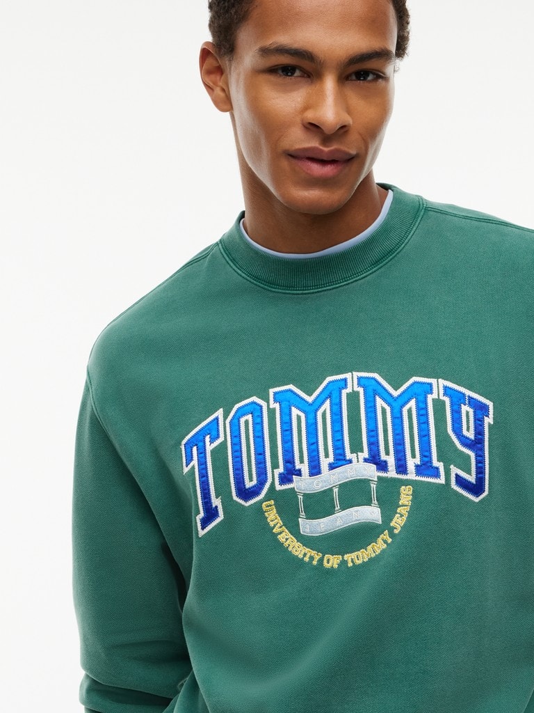 TJM RLX VARSITY CREST CNCK