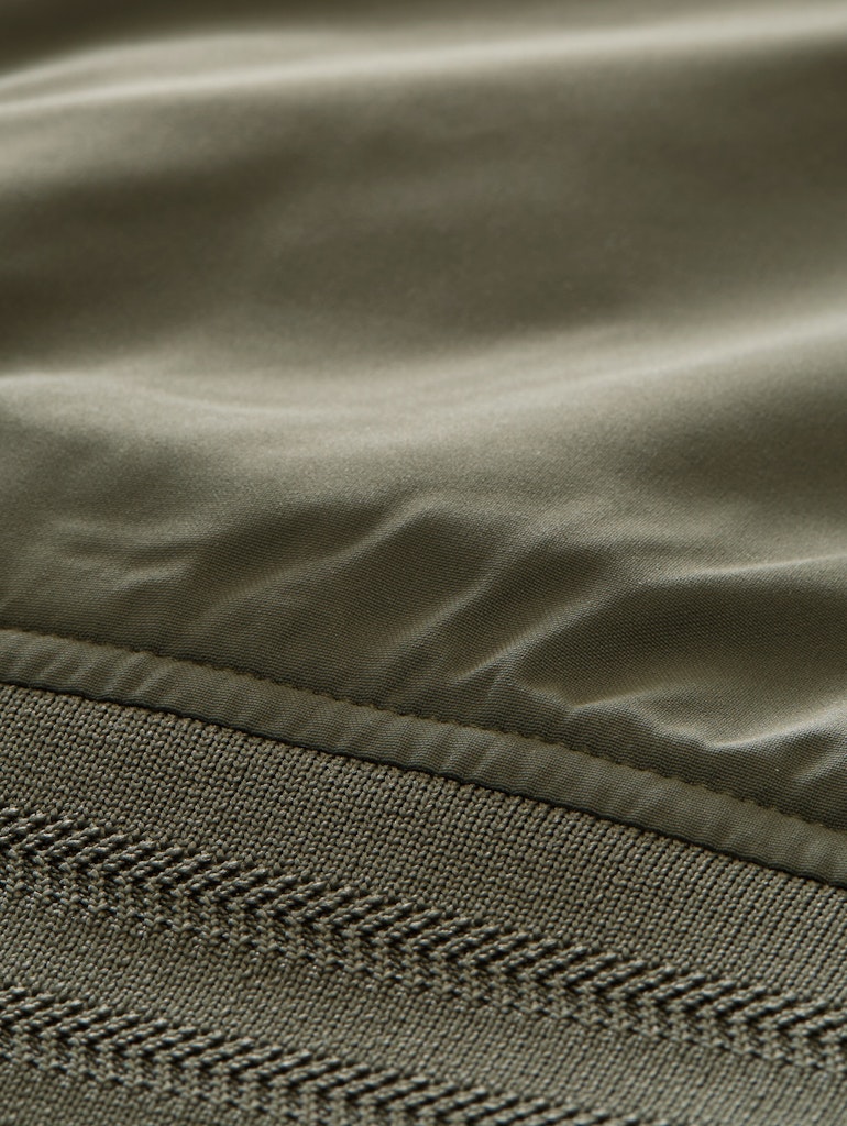 Blouson Jacke mit verstaubarer Kapuze