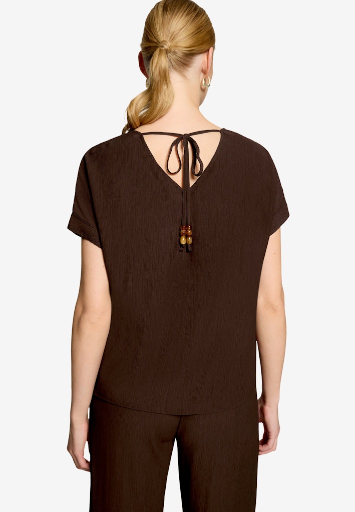Bluse mit V-Ausschnitt und Bindedetail